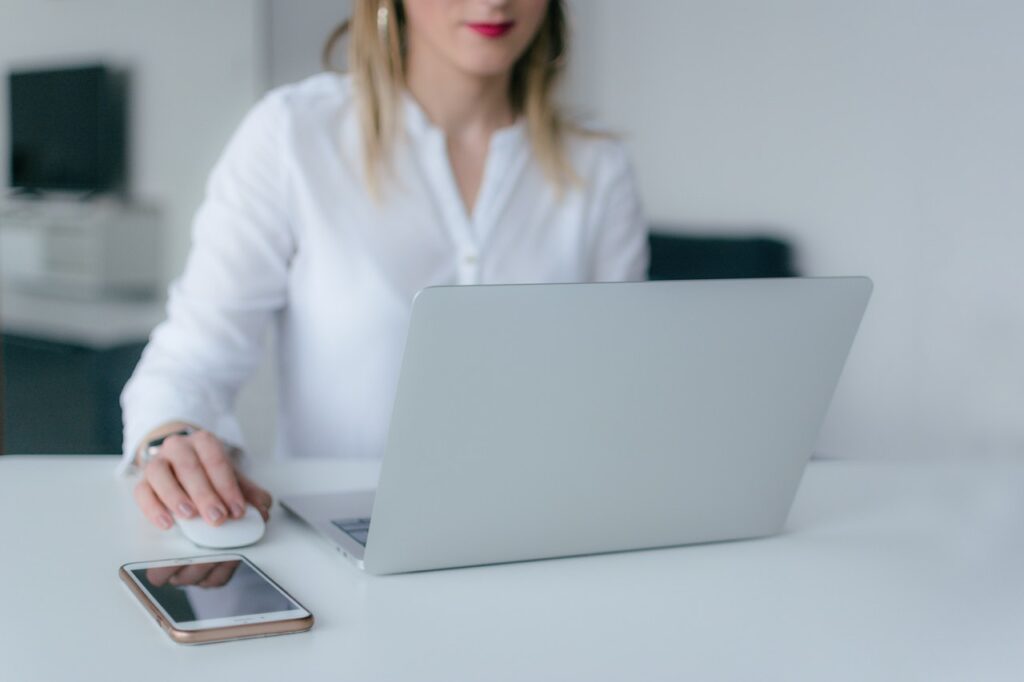 woman using a computer mouse